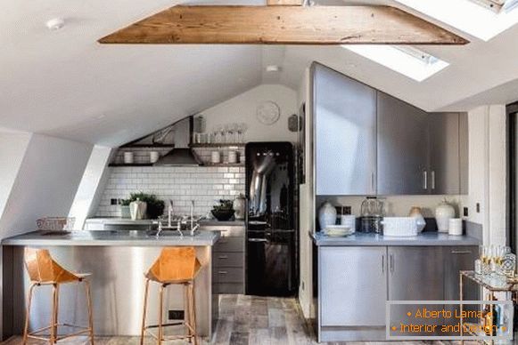 White kitchen loft with wooden floor and beams