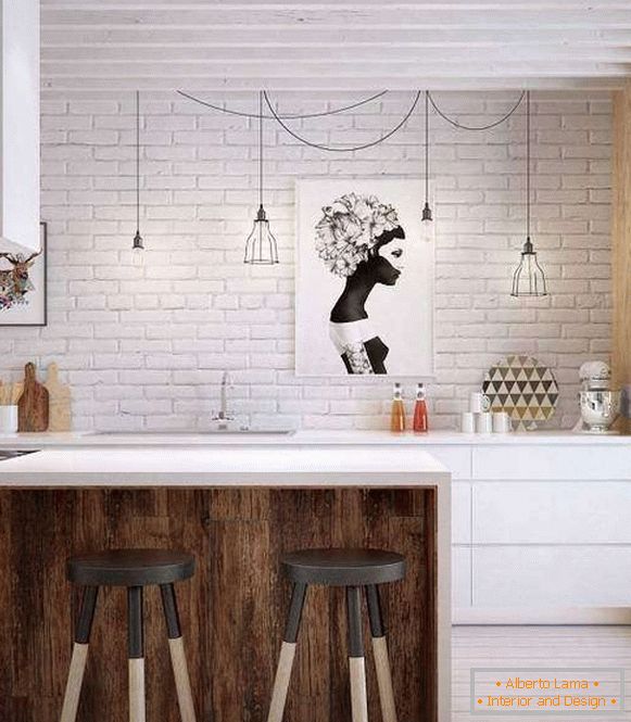 White brick wall in the kitchen in the loft style