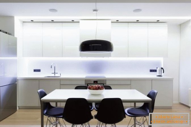Kitchen and dining area in white color