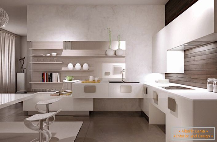 The minimalist interior of the kitchen in white color is harmoniously combined with the wooden wall decoration above the work surface.
