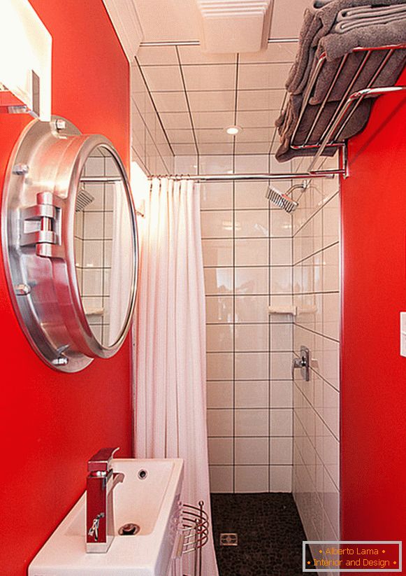 Bright red finish of a small bathroom