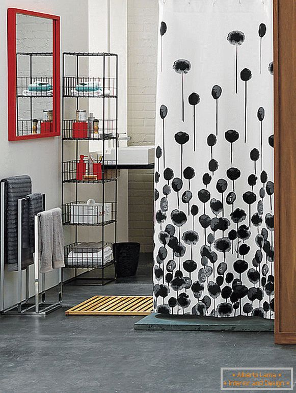 Red accents in a black and white bathroom