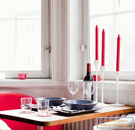 Interior of a dining room with red accents