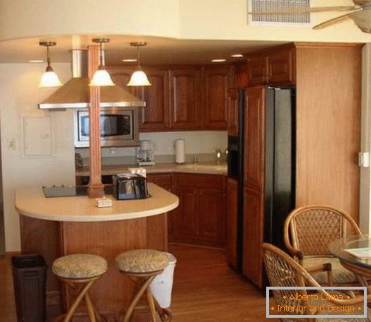 Open kitchen with rounded bar counter