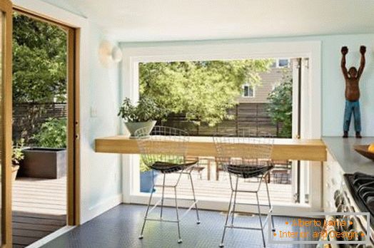 Bar rack of wood at the window