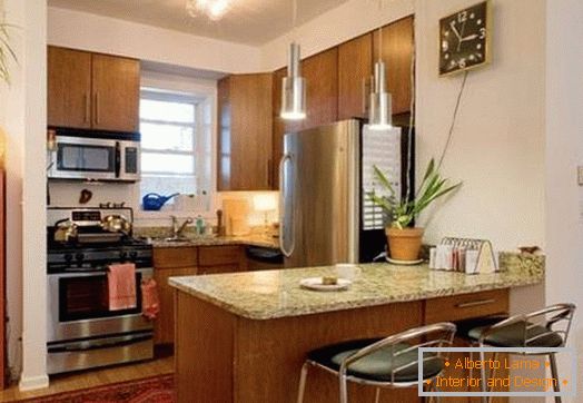 Small kitchen with granite counter