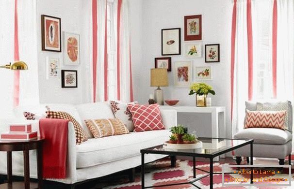 Red accents in the white living room