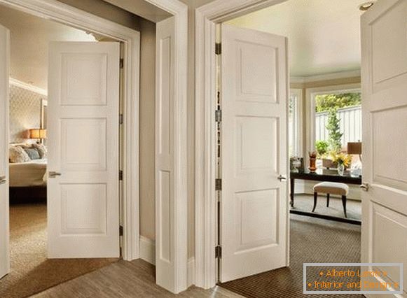 Beautiful interior doors in the interior - a photo in white