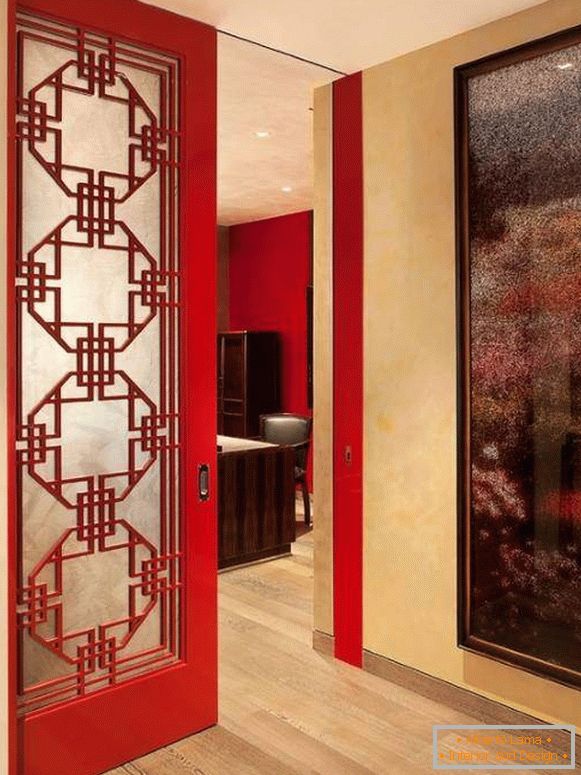 Red doors in the interior of the apartment - photo