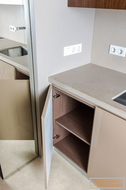 Cabinet in the kitchen with the effect of optical illusion