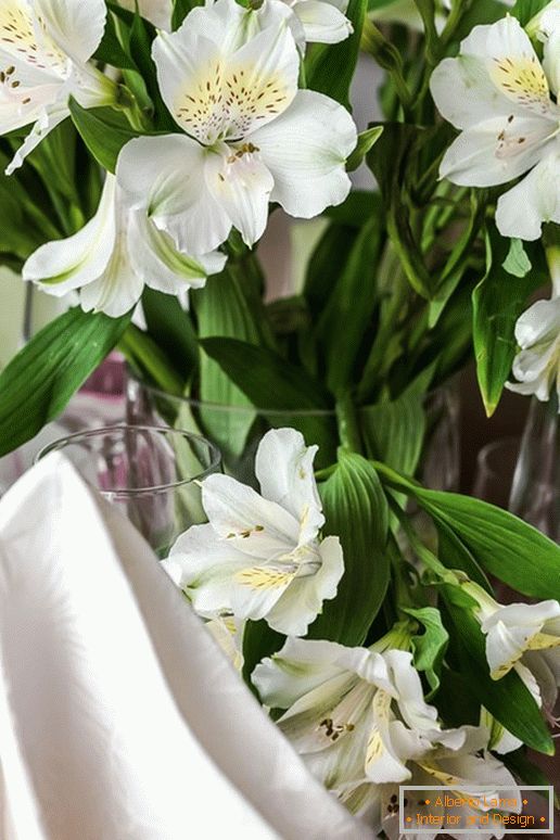 Bouquet of flowers in the kitchen with the effect of optical illusion