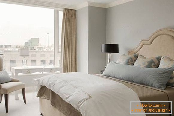 The combination of gray and beige in the interior of a small bedroom