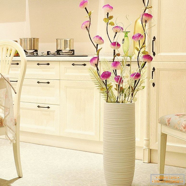 Vase with flowers in the kitchen