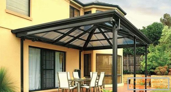 large canopy of polycarbonate in the courtyard of a private house, photo 23