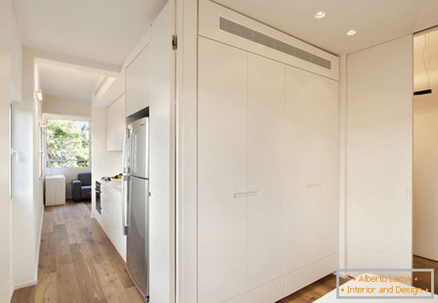 Bedroom of a rectangular studio apartment in Tel Aviv