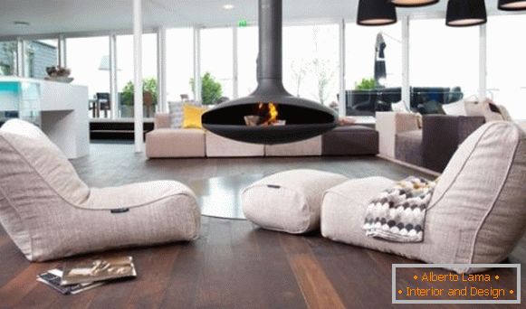 Armchairs-bags in an unusual fireplace