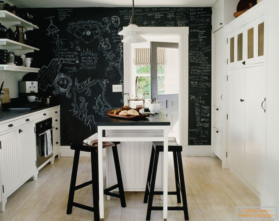 The combination of white furniture and black walls