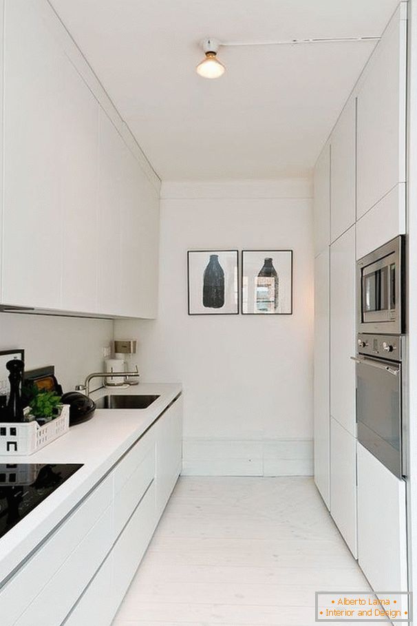 Narrow kitchen in white color