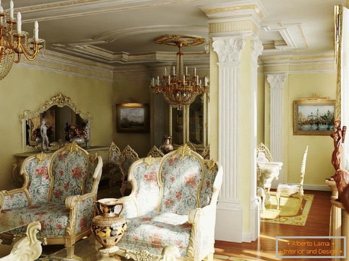 Massive chairs with floral upholstery in a baroque guest room. Ceilings and a column are decorated with stucco from plasterboard.