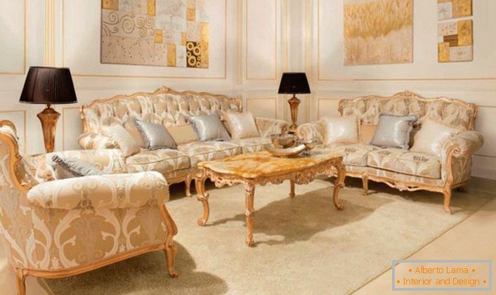 Upholstered furniture with wooden elements of gold color is in harmony with the golden panels on the walls. 