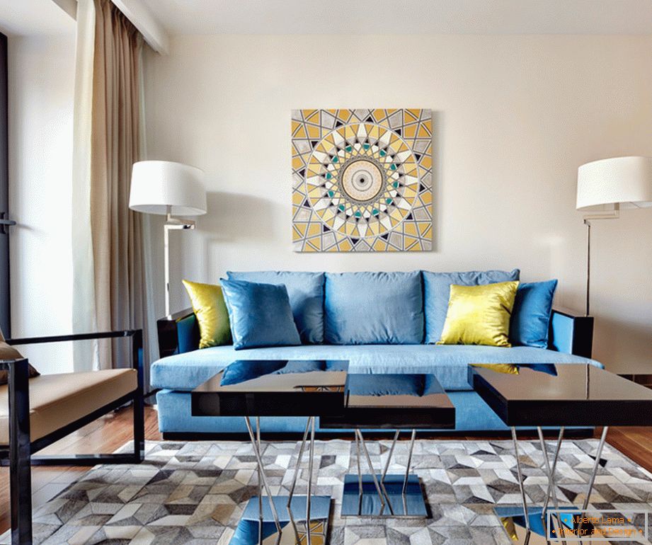 Extravagant blue sofa with yellow decorative pillows in the living room