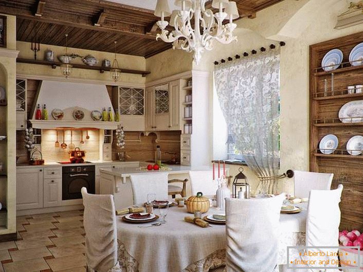 Cozy cuisine in a rustic style. Noteworthy are decorative shelves made of wood for plates and other utensils. 