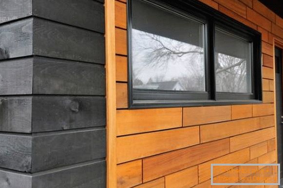 Wooden facade decoration at home photo