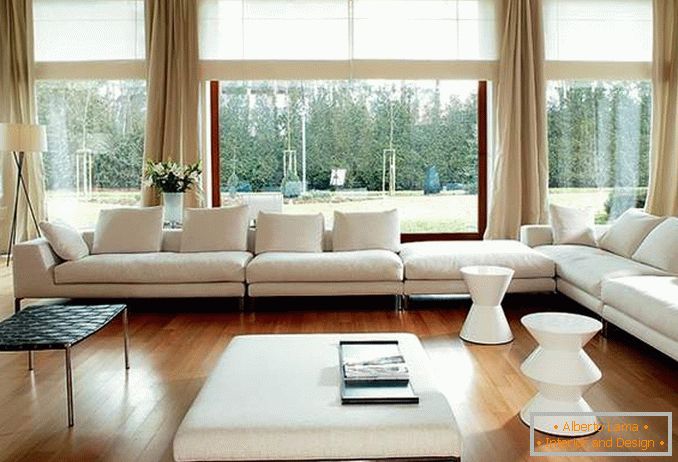Living room with panoramic windows - photo with curtains and furniture in minimalism style