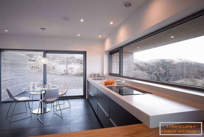 Beautiful kitchen with panoramic windows - photo inside