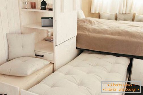 Bedroom in mobile home on wheels