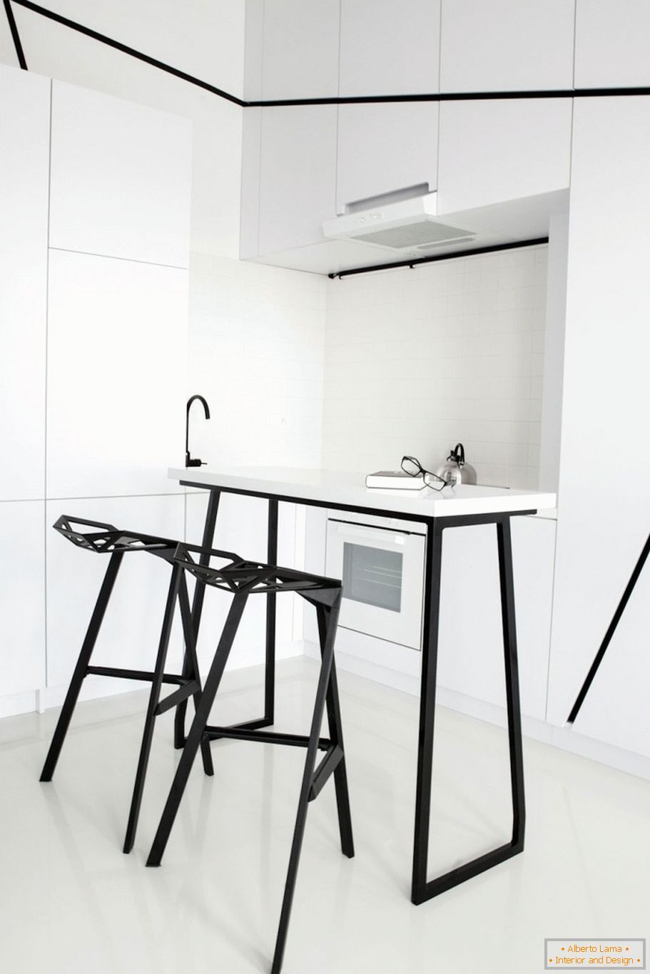 Design of the kitchen area in the interior of studio apartment Peter's Flat