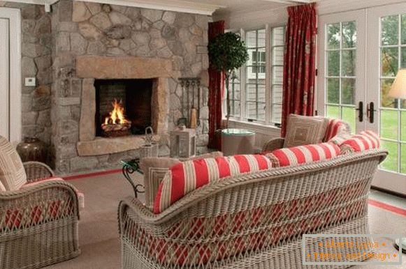 Wicker furniture in the interior of a country house - photo
