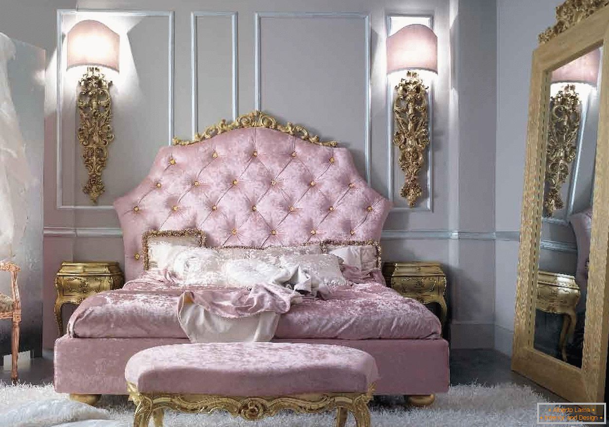 Bedroom of a young girl in the Baroque style. The view is attracted by a large mirror in a gold frame.