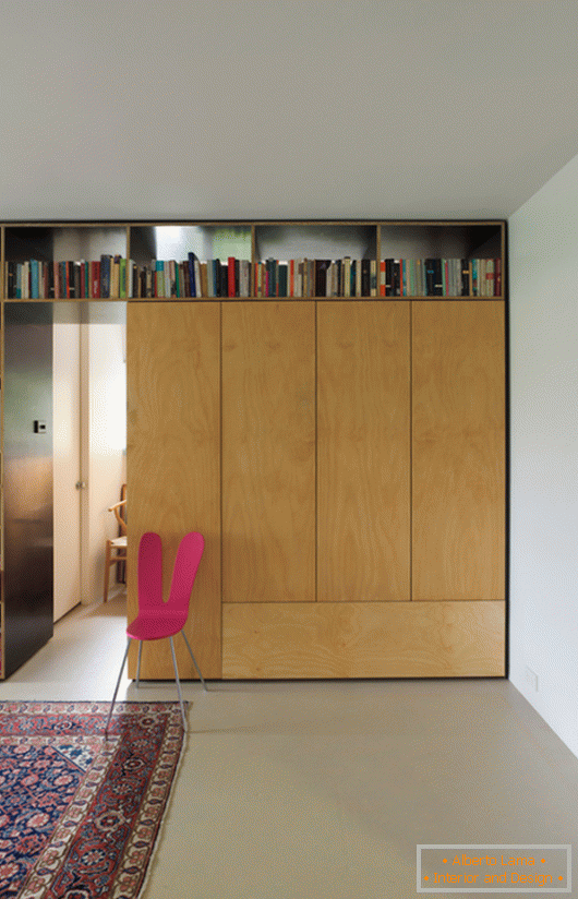 Book shelving in a small studio apartment