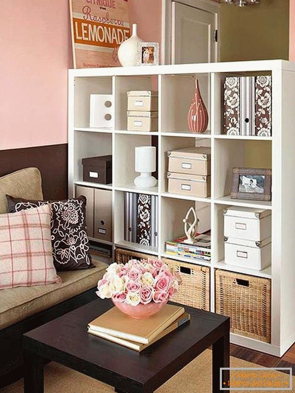 Table and wardrobe in the design of a small apartment