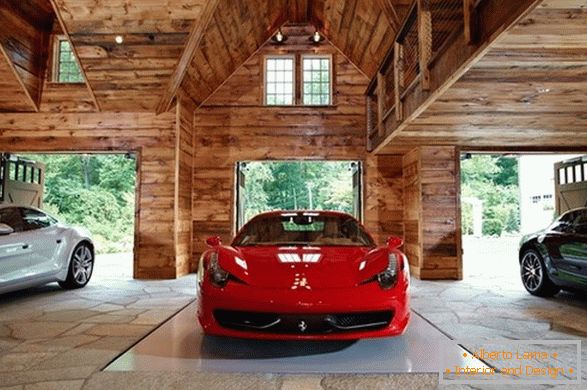 Luxury cars in a wooden garage