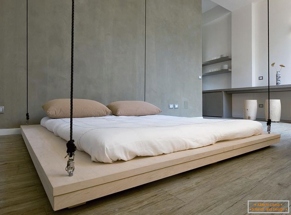 Interior of the bedroom in the style of minimalism
