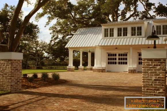 A beautiful white house with an attached canopy