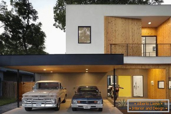 Black and white house with wooden trim and carport