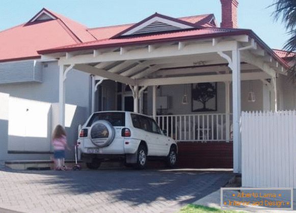 Design of a house with a canopy over the veranda and car