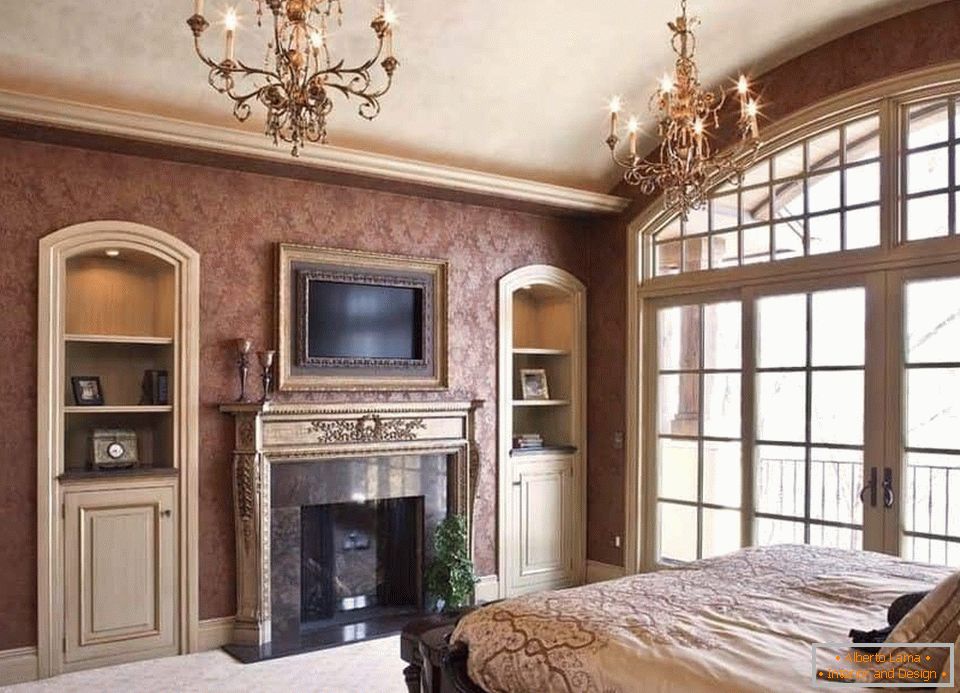 TV above the fireplace in the bedroom
