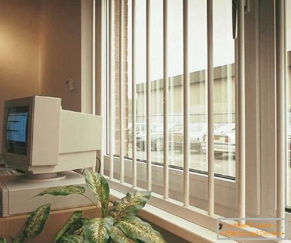 White grilles on the windows - photo from the inside of the house