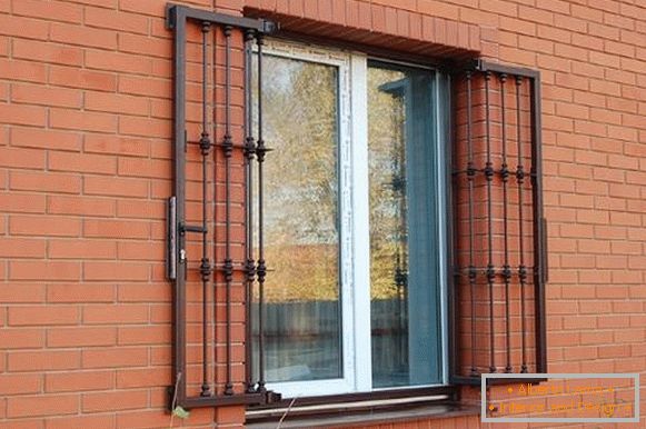 Metal hinged window grilles with lock