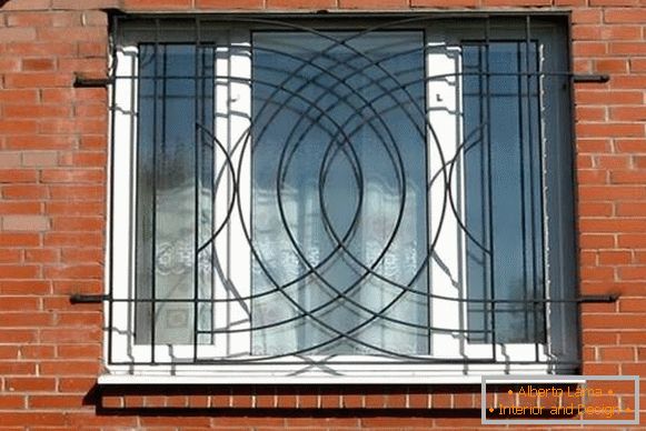 Modern window grilles - photo on the first floor