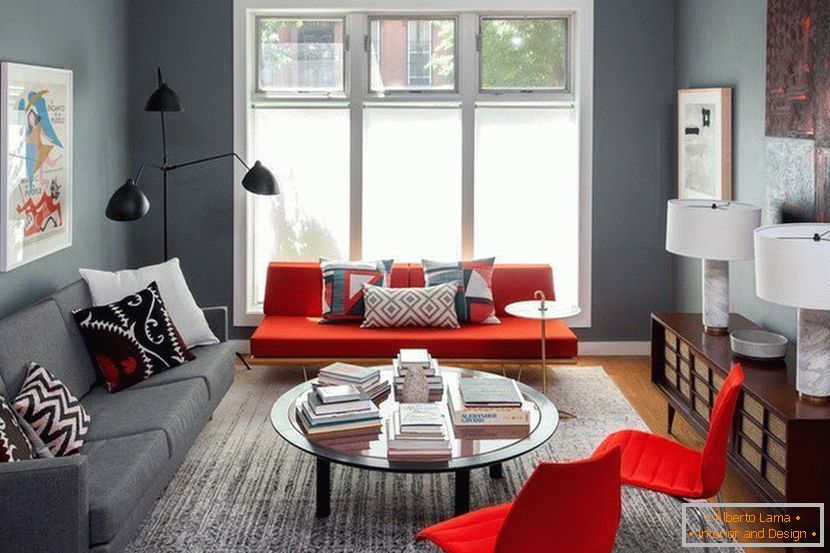 Red armchairs in the gray living room