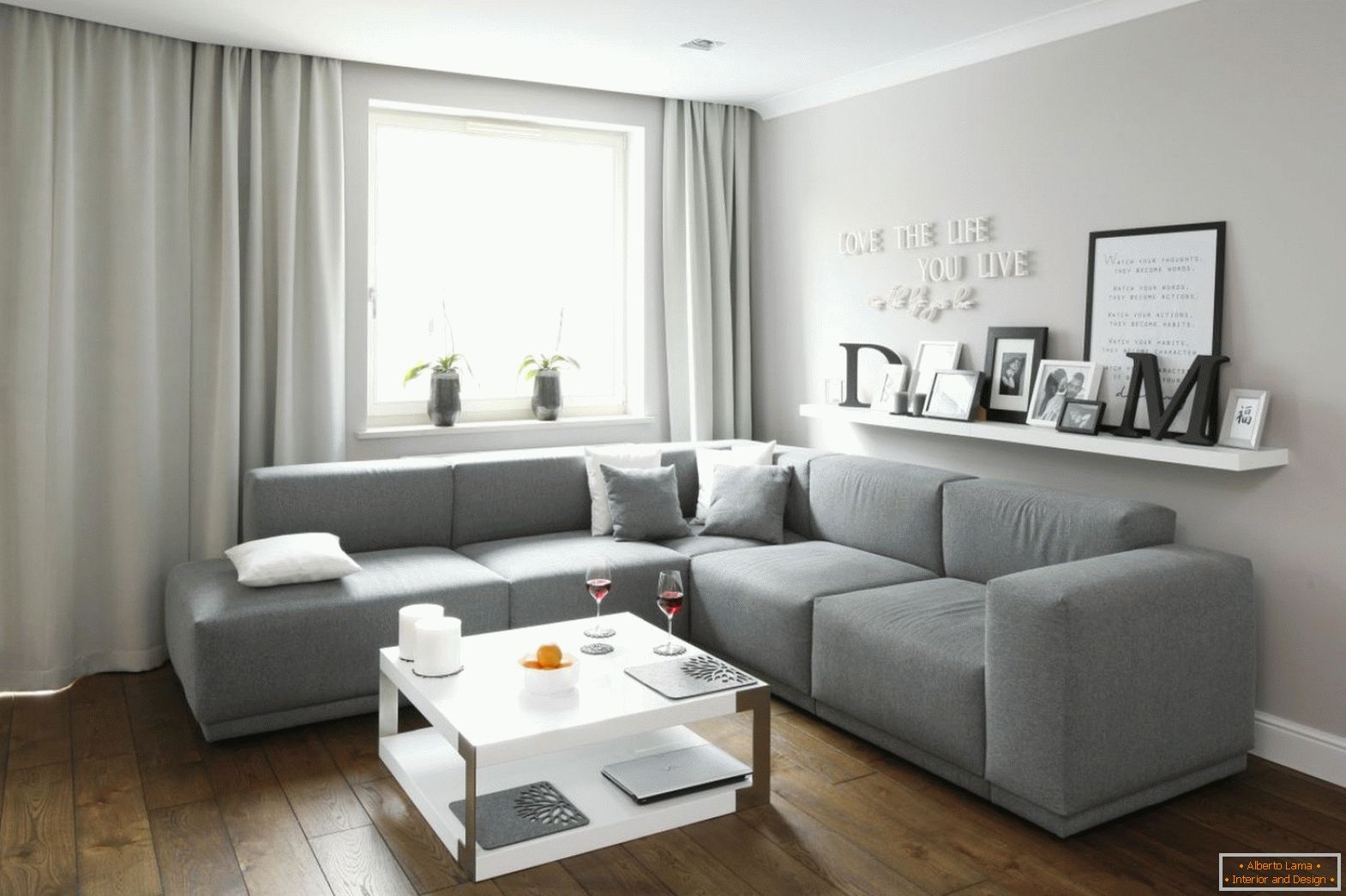 Gray sofa with fabric upholstery in the interior