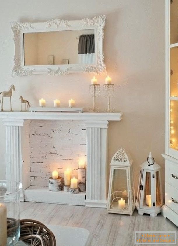 Placement of candles in a decorative fireplace