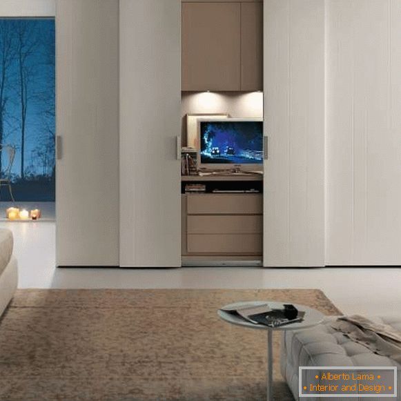 Large wardrobe compartment in the bedroom - photo with TV inside