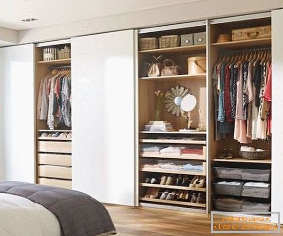 Modern large wardrobes in the bedroom - photo inside