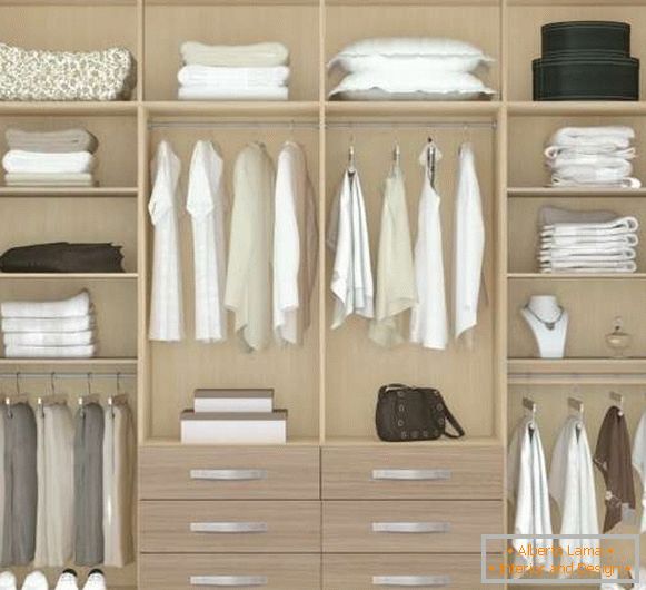Built-in double-compartment wardrobe in the bedroom - photo inside